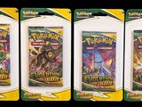 three packs of pokemon trading cards are shown on a black background