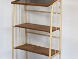 an image of a wooden shelf with three shelves on top of it
