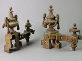three pieces of wood that are sitting on a table