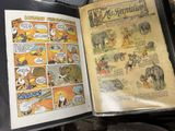 an open book with a comic strip in it