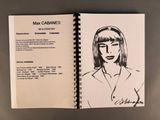 drawing of a woman ' s face in a book with a notepad