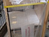 a cart with a bunch of boxes on it in a store