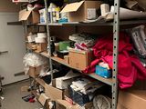 a room with a lot of boxes and boxes on the shelves