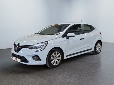 a white car is parked in a white room
