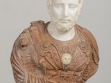 marble bust of a man with a beard, wearing a leather jacket