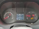 a close up of a car dashboard with a speedometer and gauges