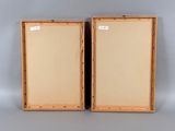 pair of antique wooden picture frames with a white background