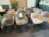 a lot of chairs that are sitting in a room
