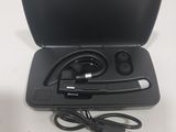 a black case with a pair of ear buds in it