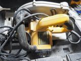 a yellow corded drill and a black corded corded corded corded corded corded corded corded corded corded corded
