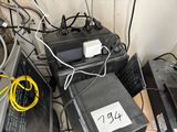 a pile of electronics that is sitting on top of each other