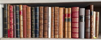 many books that are on a shelf in a book case