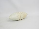 an image of a white stone object on a white surface