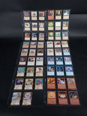 a black table topped with lots of cards on top of it