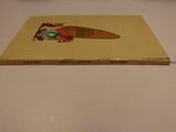 a yellow book with a picture of a fish on it
