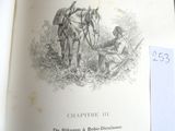 un livre ouvert sur lequel figure le dessin d'un homme en train de labourer un champ