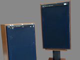 two wooden speakers with a blue screen on top of them