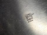 an image of a close up of a metal object on a table