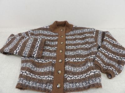 brown and white knitted sweater on a white surface