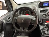 the interior of a car with a steering wheel and dashboard controls