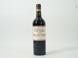 a bottle of wine that is sitting on a table