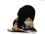 the helmet of a soldier with a black fur on top of it