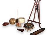 une image représentant un ensemble d'objets, notamment un chevalet, un bol, une bougie et un bougeoir