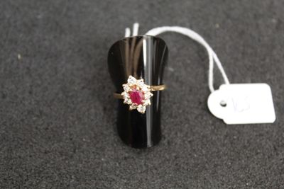 a close up of a ring on a black surface with a price tag