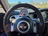 steering wheel of a car with gauges and gauges on it