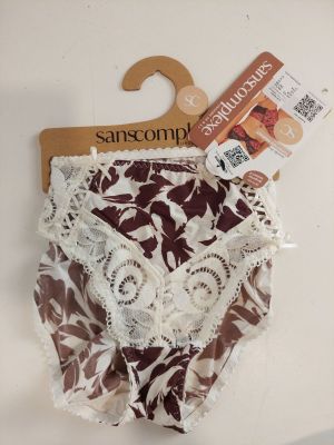 a brown and white panties on a hanger on a table