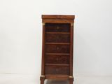 an antique wooden chest of drawers with brass hardware on the top and bottom