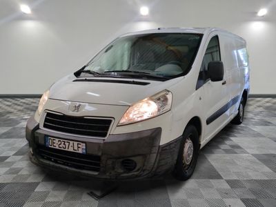 a picture of a white van parked in a room