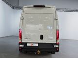 an image of a white van parked in a garage