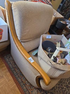 a chair with a box on it and a chair with a box in it