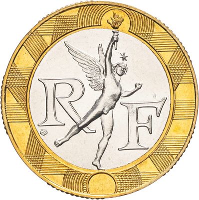 Gros plan sur une pièce d'or ornée d'un ange
