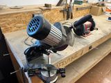 someone is using a circular saw to cut a piece of wood on a workbench