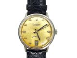 a close up of a wrist watch on a white background