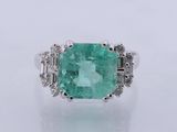 an emerald and diamond ring