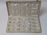 a box with a lot of glass pieces inside of it