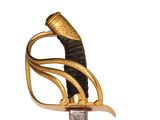 an image of a sword with a gold handle on a white background