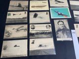 a lot of old photos of airplanes on the table