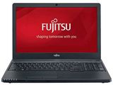 a laptop with the fujitsu logo on the screen