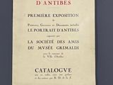 an old book with french writing on it sitting on top of a table