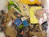 a plastic bag filled with assorted items on a table