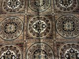 an image of a rug with many different designs on it