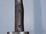 a close up of a knife that is on a table
