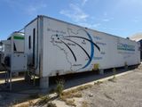 a truck that is parked on the side of the road