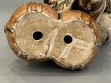 an image of a sculpture of a bird made out of wood