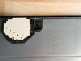 a close up of a piece of wood on top of a laptop