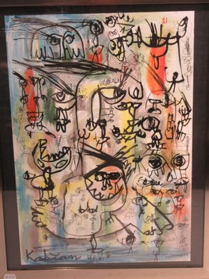 a picture of a painting on display in a glass case